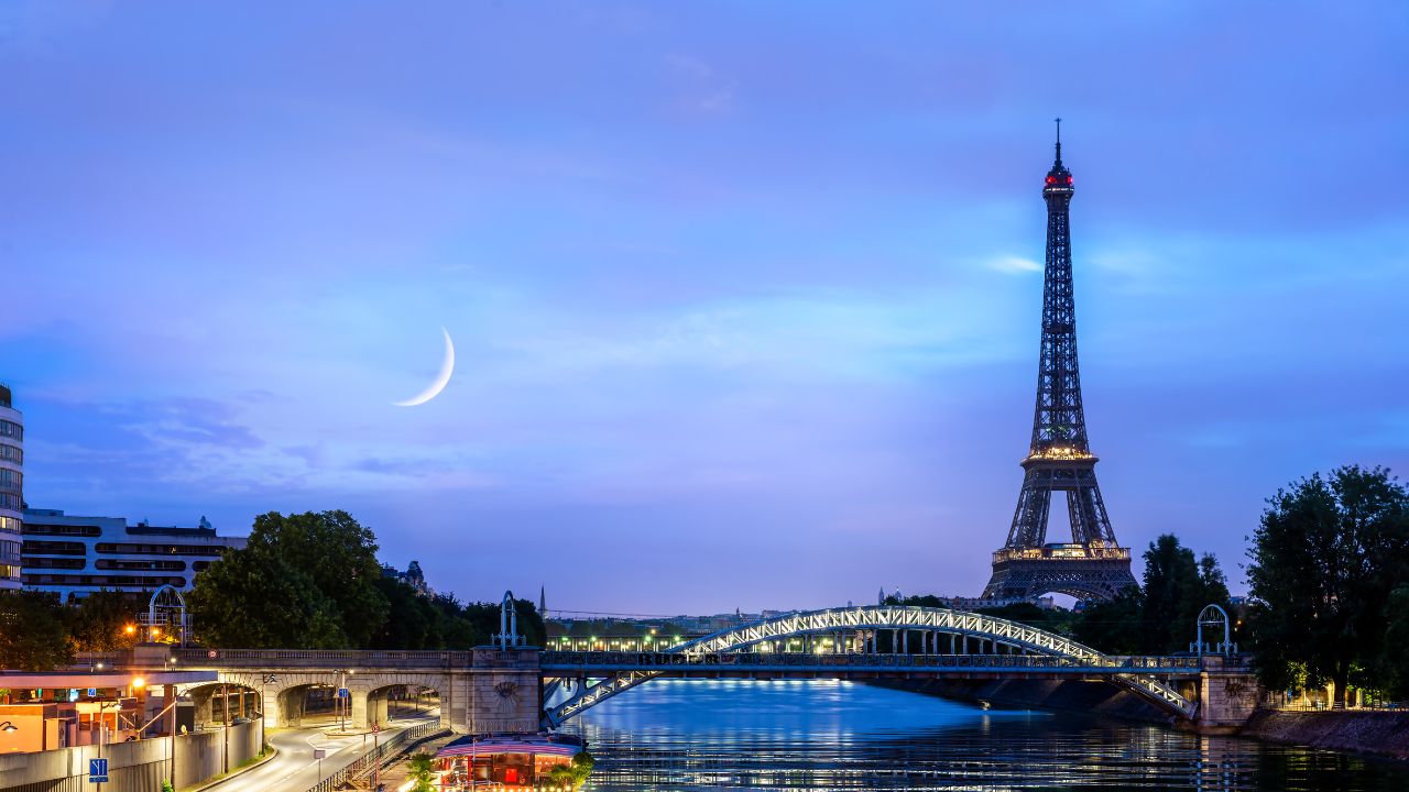 Vibrant autumnal cityscape with iconic landmarks like the Eiffel Tower, Prague&apos;s Charles Bridge